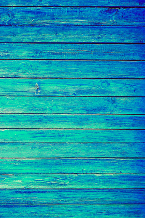 Abstract Blue or Azure Wooden Wall Planks Vertical Texture. Old Retro Wood Rustic Shabby Background. Peeled Azure Weathered Surface. Natural Wood Board Panel.の写真素材