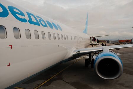 Bonn-Cologne, Germany, 16 Dec. 2017: Bonn Cologne International aipport. Livery of the airline Pobeda on the Boeing plane.のeditorial素材