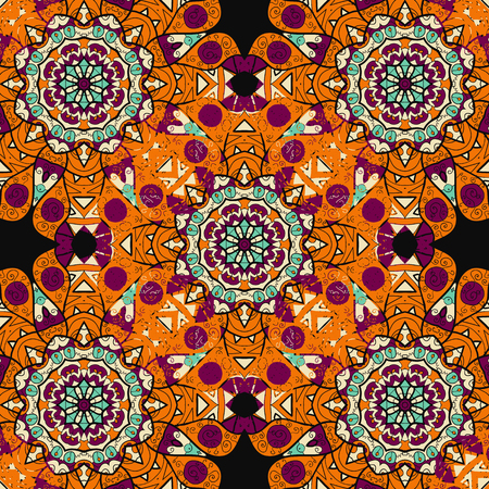 Seamless mandalatiled pattern in orange color over black background. Floral indian vector. Ornate islamic  arabic ottoman indian motifのイラスト素材