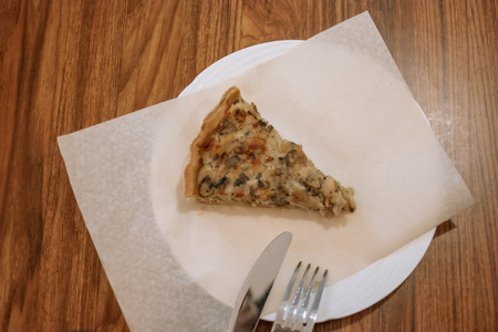 Homemade-style pice of pie on paper above viewの写真素材