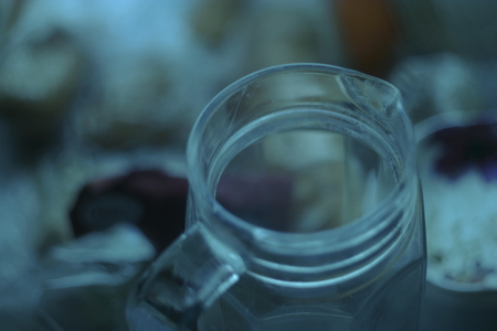Low light shot of glass jar selective focusの写真素材