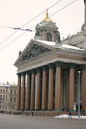 Saint Petersburg, Russia - Feb 26, 2016: Facade of Saint Isaacs Cathedral in front of the winter sky. Detail.のeditorial素材