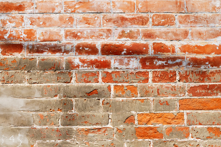 Weathered texture of old red brick wall background, grungy rusty blocks abandoned Stained Old Brick Wallの写真素材