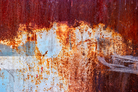 Adandoned plant fence - half painted rusty sheet, ready to be frame for your designの写真素材