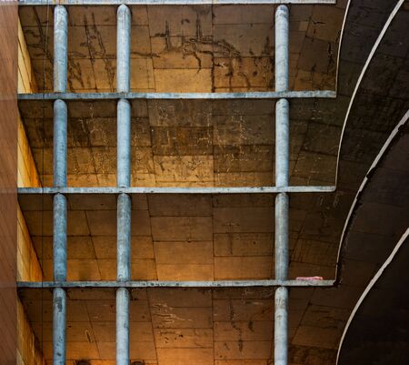 Monolith building conctruction - square and bended base structure of floors and celling with pillarsの写真素材