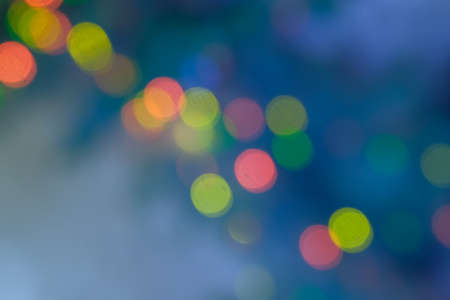 Blue mist bokeh defocused christmas lights, a lot of copyspace on both sides.