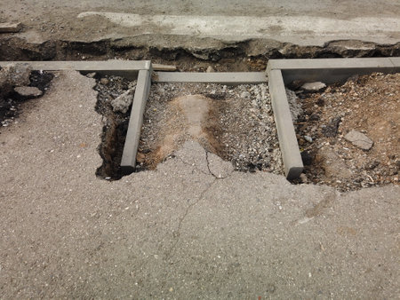 Pedestrian crossing repair in Russia. New curb stone installed for borderless space disabled people. Copyspace.の写真素材