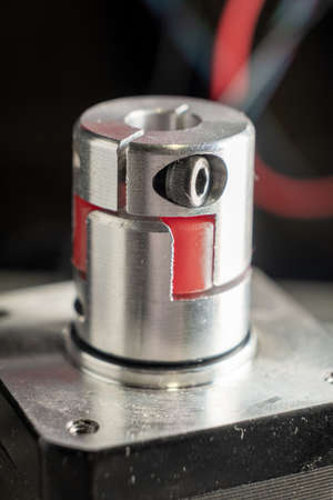 Coupling placed on the axe of stepping motor macro image.の写真素材