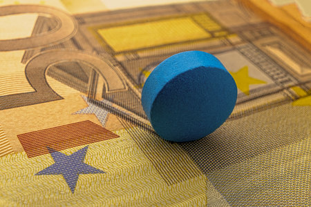 Herbal drug one blue pill on 50 euro banknote macro.の写真素材