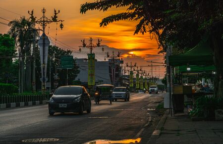 car in evening townの写真素材