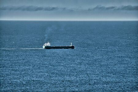 Ship in the open oceanの写真素材