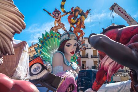 Valencia, Spain; March 9 2019: Assembly of the Falla of Jerusalen street, Fallas de Valencia celebration. Traditional medieval festivity. Colorful woman sculpture.のeditorial素材
