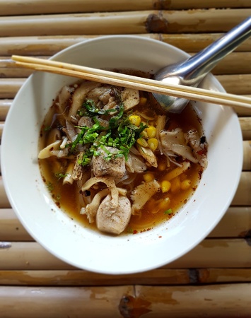 Noodle herbs with spicy soup.の写真素材