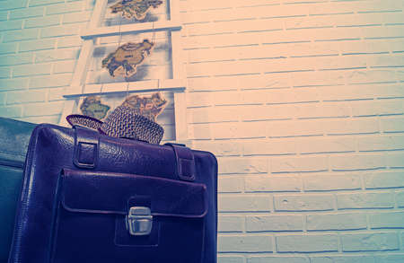 old suitcases and stairs on brick wall backgroundの写真素材