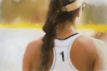 Volleyball player is a female athlete volley ball player getting ready to serve the ball.の写真素材