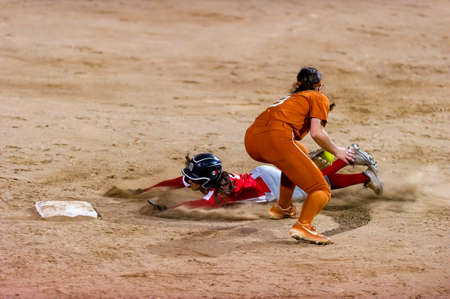 The Texas Longhorns Woman Softball Team Faces Off Against the Mexican Woman National Team in Tournament playのeditorial素材