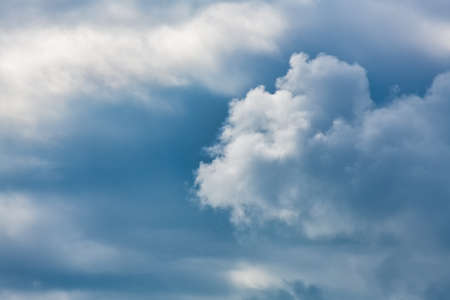 Bright White Clouds In A Blue Twilight Sky