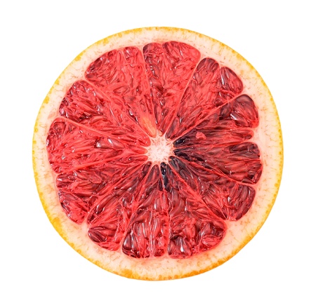 Dark red grapefruit slice isolated on white backgroundの写真素材