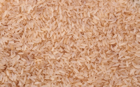 Yellow rice texture or backgroundの写真素材