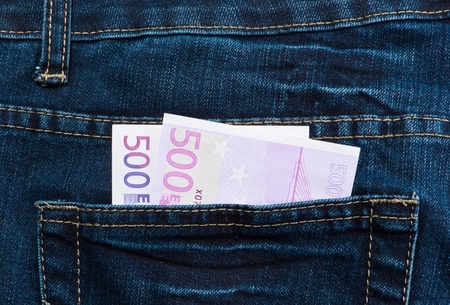 Money in the back side of jeansの写真素材