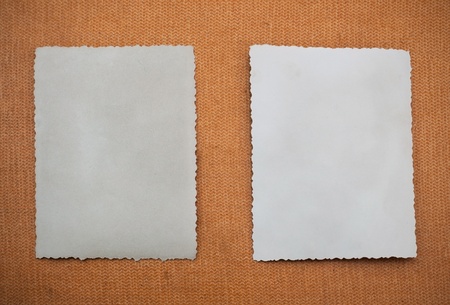 Two old photo on vintage backgroundの写真素材