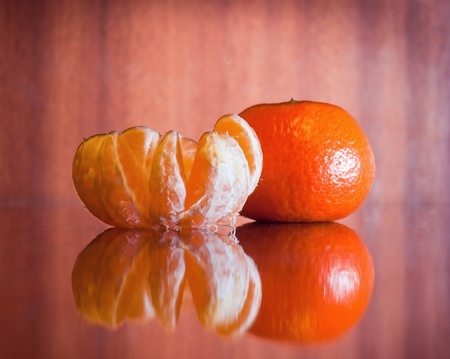 Tangerine on the wooden backgroundの写真素材