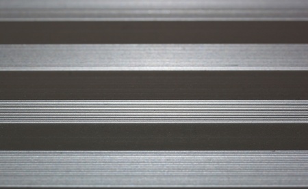 Lined metal surfaceの写真素材