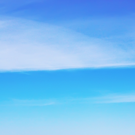 Soft white clouds on blue skyの写真素材