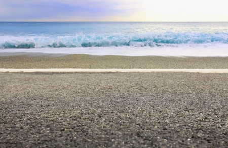 Walking path near sea at sunsetの写真素材