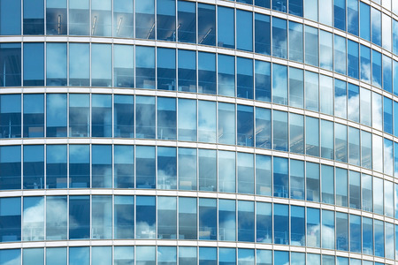 Glass building with sky reflection