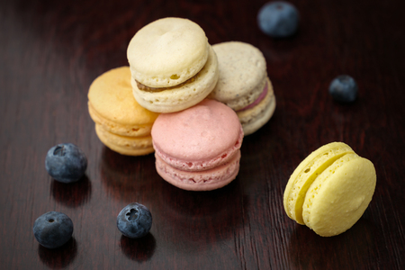 Set of macarons on table with blueberryの写真素材