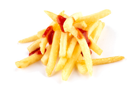 Fried potato slices in ketchupの写真素材