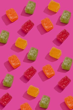 Marmalade mix as pattern on pink backgroundの写真素材