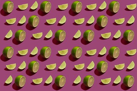 Pattern of the ripe lime cut parts on color background