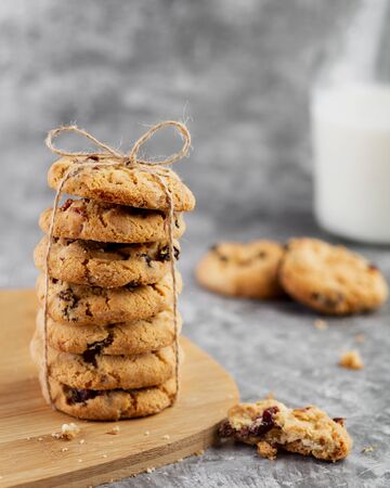Stack of cookies with milk on the tableの写真素材