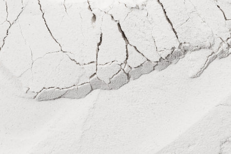 Cracks in the surface of concrete or stoneの写真素材