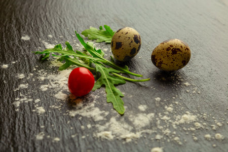 Rucola, chery tomato and quail eggsの写真素材