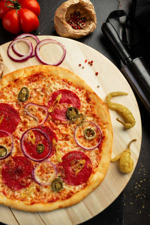 Jalapeno and salami pizzaの写真素材