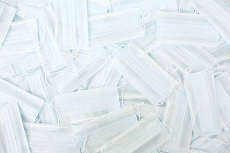 Medical hygienic mask, Face protective masks on blue background.Disposable surgical face mask...
