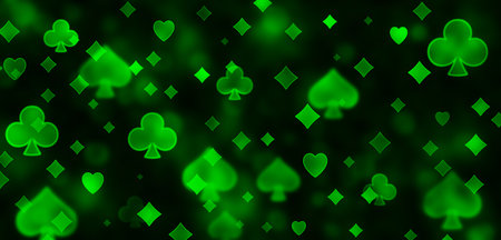 Green abstract poker bokeh pattern of playing card symbols.