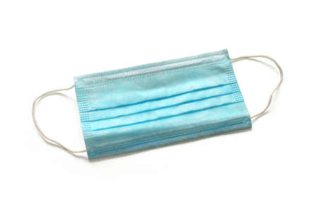 Blue medical mask isolated on white background.