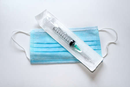 Blue medical mask on white background.