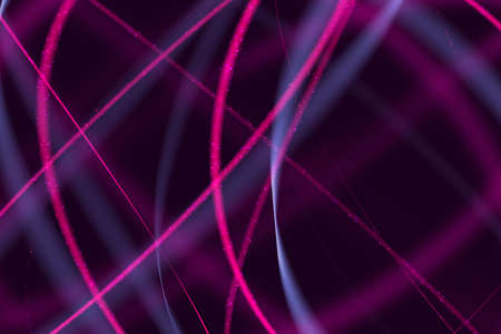 Curved abstract glowing line on a dark background.の写真素材