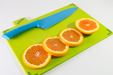 Knife And Slices Of Orangesの写真素材