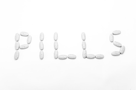 Drugs and pills isolated on white backgroundの写真素材