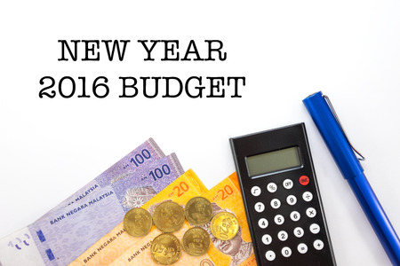 Malaysia Money with Calculator Pen and Notebook Isolated On White Backgroundの写真素材
