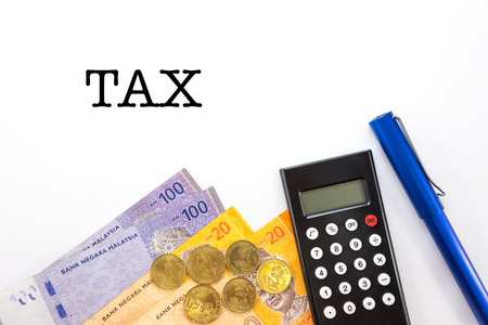 Malaysia Money with Calculator Pen and Notebook Isolated On White Backgroundの写真素材