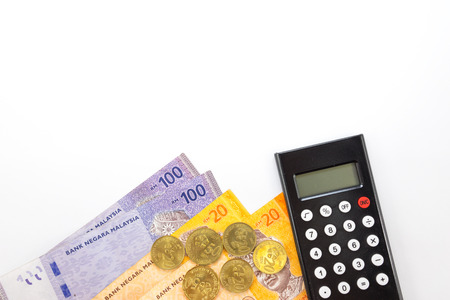 Malaysia Money with Calculator Pen and Notebook Isolated On White Backgroundの写真素材