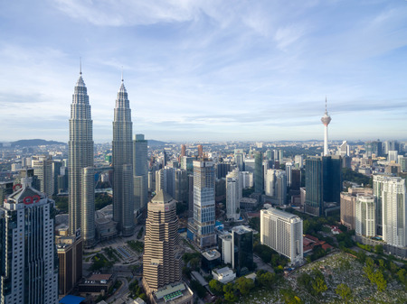 Kuala Lumpur, Malaysia - Jun 25, 2016: Aerial view of Kuala Lumpur city skyline during bright...