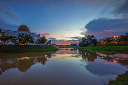 Majestic Sunset Over a Mosque by the lake with perfect reflectionのeditorial素材